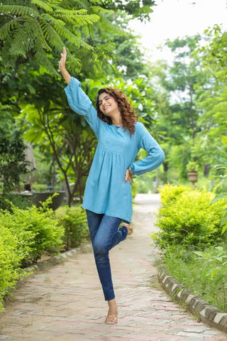 Women Blue Solid Embroidered A-Line Kurti