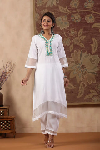 Women White Yoke Design Thread Work Straight Kurta With Trousers