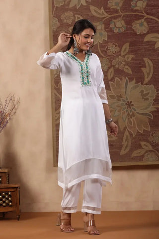 Women White Yoke Design Thread Work Straight Kurta With Trousers