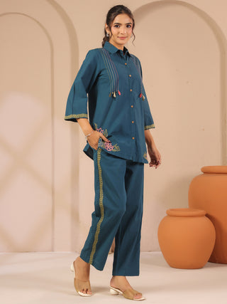 Teal blue solid embroidered cord set with shirt style tunic and matching trouser