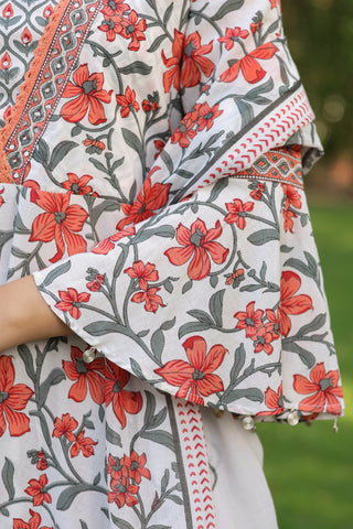 Floral printed cotton suit set with sequinned kurta and dupatta