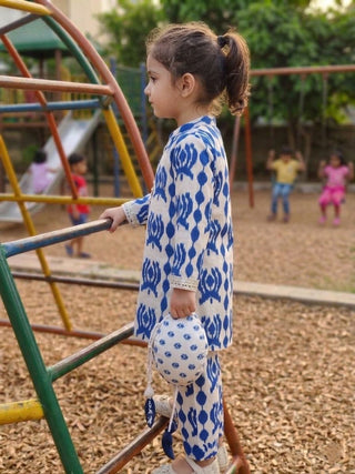 Girls printed cotton tunic featuring lace detailing and trousers