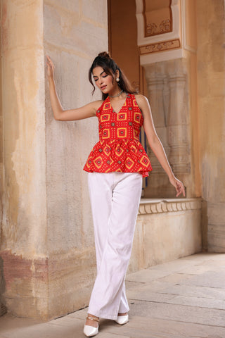 Red printed cotton sleeveless peplum top