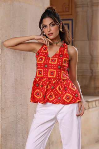 Sleeveless red cotton peplum top