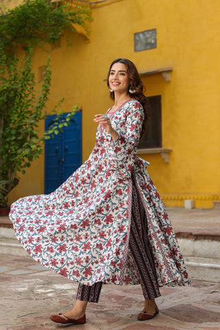 Soft cotton kurta set with floral prints and subtle sequin work