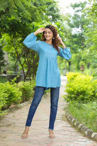 Women Blue Solid Embroidered A-Line Kurti