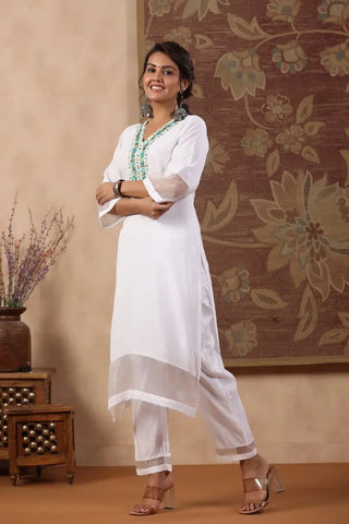 Women White Yoke Design Thread Work Straight Kurta With Trousers